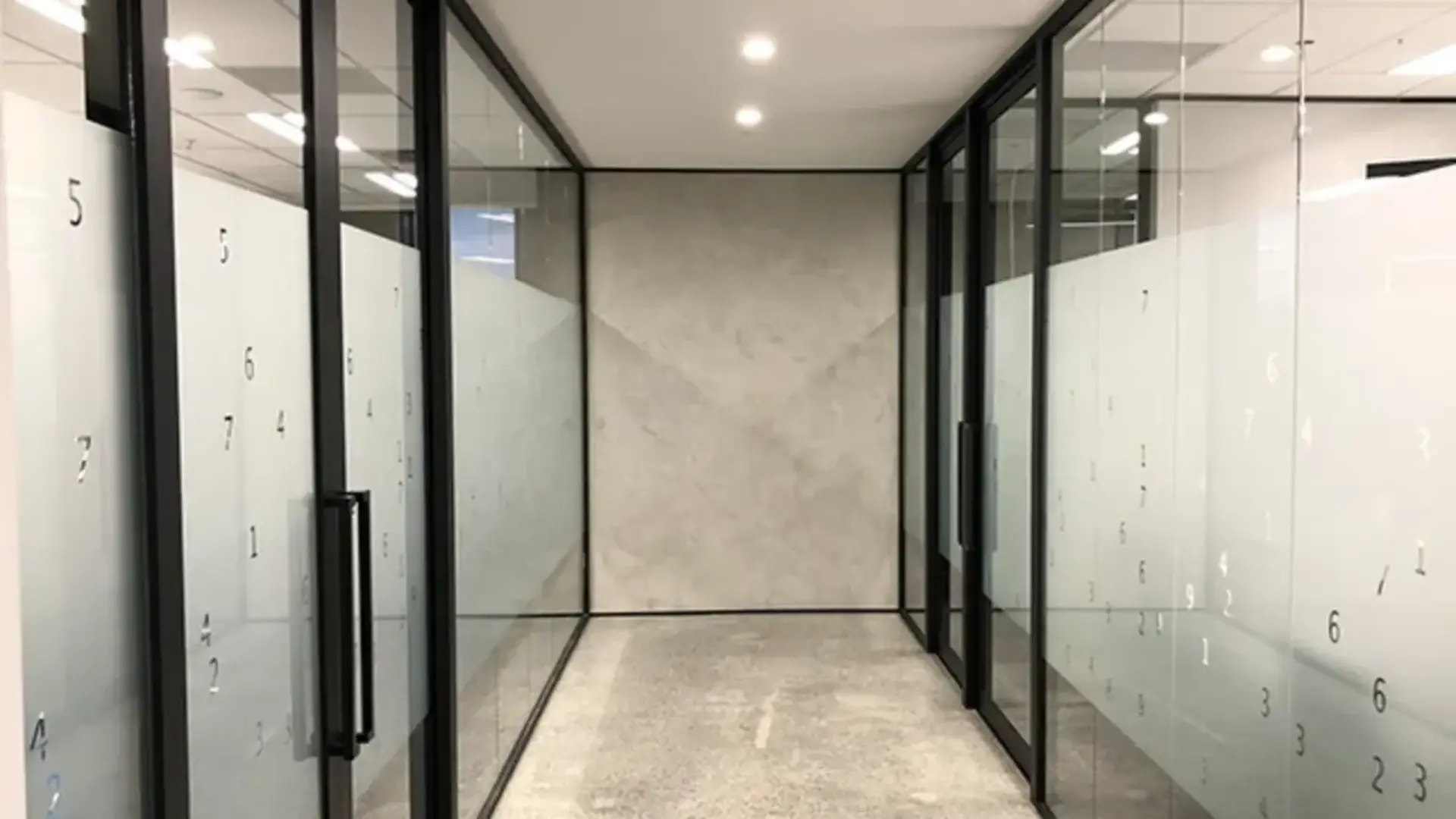 Aluminium and glass office partition with framed cabins